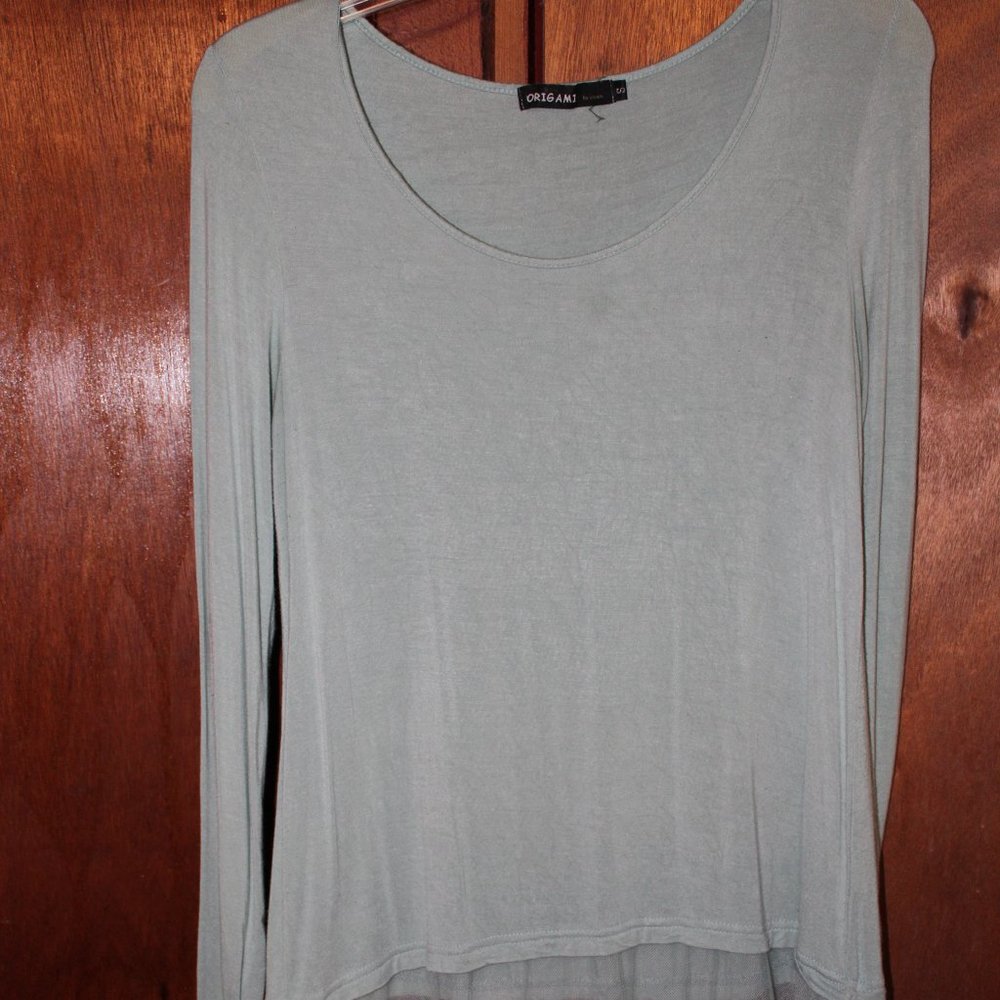 Origami blue long sleeve detailed bottom blouse.